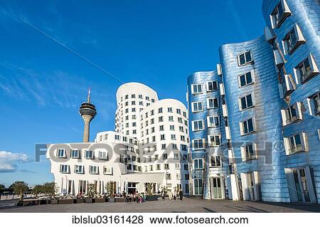 Stock Photo - "New Zollhof office buildings designed by architect Frank O Gehry, Medienhafen, media harbour, Dusseldorf, Rhineland, North Rhine-Westphalia, Germany, Europe". Fotosearch
