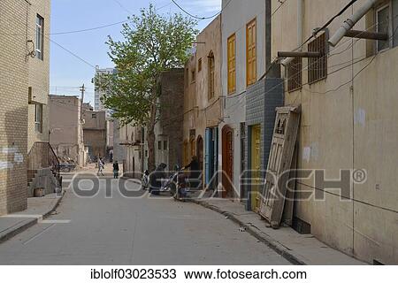 "Newly built mudbrick houses for the Uyghur minority from a state construction program, Uyghur Muslim Quarter, Kashgar, Seidenstrasse, Xinjiang, China, People's Republic of China, Asia" View Large Photo Image Stock Image - "Newly built mudbrick houses for the Uyghur minority from a state construction program, Uyghur Muslim Quarter, Kashgar, Seidenstrasse, Xinjiang, China, People's Republic of China, Asia". Fotosearch