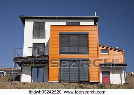 Stock Image - "Newly built residential house with a flat roof at Phoenix-See Lake, Horde, Dortmund, Ruhr district, North Rhine-Westphalia, Germany, Europe". Fotosearch