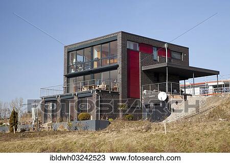 "Newly built residential house with a flat roof at Phoenix-See Lake, Horde, Dortmund, Ruhr district, North Rhine-Westphalia, Germany, Europe" View Large Photo Image Stock Image - "Newly built residential house with a flat roof at Phoenix-See Lake, Horde, Dortmund, Ruhr district, North Rhine-Westphalia, Germany, Europe". Fotosearch