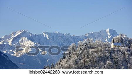 Stock Photo - "Nicholas Chapel on Vestbuehl Mountain, Wetterstein Range, Alpspitze Mountain, Zugspitze Mountain, Eschenlohe, Loisachtal Valley, Upper Bavaria, Bavaria, Germany, Europe". Fotosearch