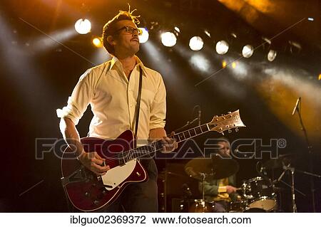 "Nico Feer, guitarist of the Swiss band Kabel playing live at the Schueuer, Luzern, Switzerland, Europe" View Large Photo Image Stock Image - "Nico Feer, guitarist of the Swiss band Kabel playing live at the Schueuer, Luzern, Switzerland, Europe". Fotosearch