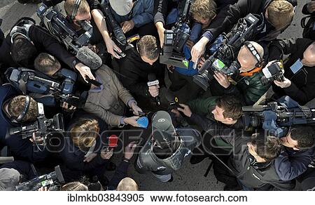 Stock Photography - "Nico Rosberg, GER, Mercedes, surrounded by journalists with cameras and microphones during an interview, Formula 1 winter testing, Circuito de Velocidad, Jerez de la Frontera, Andalusia, Spain, Europe". Fotosearch