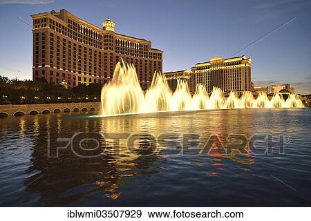 "Night scene, fountain display, luxury hotels and casinos, Bellagio, Caesar's Palace, The Mirage, Las Vegas, Nevada, United States, North America" View Large Photo Image Stock Photo - "Night scene, fountain display, luxury hotels and casinos, Bellagio, Caesar's Palace, The Mirage, Las Vegas, Nevada, United States, North America". Fotosearch