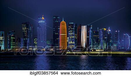 "Night scene of the skyline of Doha with Al Bidda Tower, World Trade Center, Palm Tower 1 and 2, Burj Qatar Tower, Doha Corniche, Doha, Qatar, Asia" View Large Photo Image Picture - "Night scene of the skyline of Doha with Al Bidda Tower, World Trade Center, Palm Tower 1 and 2, Burj Qatar Tower, Doha Corniche, Doha, Qatar, Asia". Fotosearch