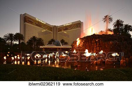 "Night scene, show, artificial volcanic eruption in front of The Mirage, luxury hotel and casino, Las Vegas, Nevada, United States of America, USA, PublicGround" View Large Photo Image Stock Photo - "Night scene, show, artificial volcanic eruption in front of The Mirage, luxury hotel and casino, Las Vegas, Nevada, United States of America, USA, PublicGround". Fotosearch