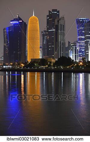 "Night scene, skyline of Doha with Al Bidda Tower, World Trade Center, Palm Tower 1 and 2, Burj Qatar Tower with golden illumination, Tornado Tower, Doha Corniche, Doha, Doha, Qatar, Asia" View Large Photo Image Stock Image - "Night scene, skyline of Doha with Al Bidda Tower, World Trade Center, Palm Tower 1 and 2, Burj Qatar Tower with golden illumination, Tornado Tower, Doha Corniche, Doha, Doha, Qatar, Asia". Fotosearch