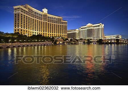 Stock Image - "Night shot, Bellagio, Caesars Palace, The Mirage, luxury hotels and casinos, Las Vegas, Nevada, USA, PublicGround". Fotosearch
