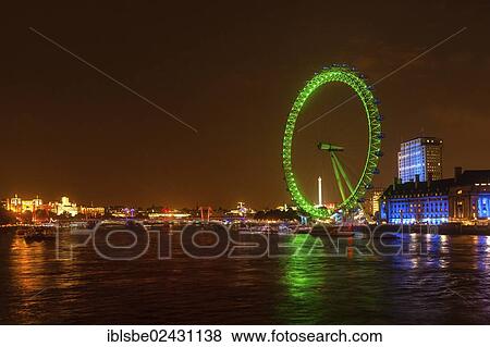 Stock Photo - "Night shot, The London Eye in green, County Hall, River Thames, London, England, United Kingdom, Europe". Fotosearch