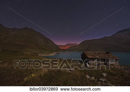 "Night sky above Mont Cenis lake and a hut, Savoie, France, Europe" View Large Photo Image Stock Photo - "Night sky above Mont Cenis lake and a hut, Savoie, France, Europe". Fotosearch