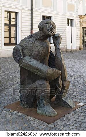 Stock Photo - Nighthart, Neidhart Melancholicus, bronze sculpture, 2001, by Dietrich Klinge, born in 1954, pedestrian zone of Schwaebisch Gmuend, Baden-Wuerttemberg, Germany, Europe. Fotosearch