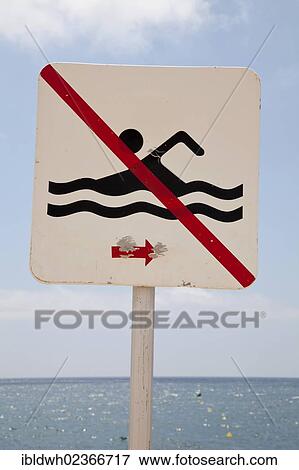 "No swimming"""" sign at the beach, Calella de la Costa, Costa del Maresme, Catalonia, Spain, Europe, PublicGround, Europe" View Large Photo Image Stock Photo - "No swimming"""" sign at the beach, Calella de la Costa, Costa del Maresme, Catalonia, Spain, Europe, PublicGround, Europe". Fotosearch