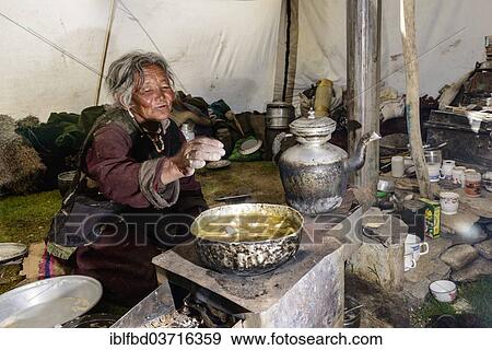 "Nomad woman preparing food inside her tent, Korzok, Ladakh, Jammu and Kashmir, India, Asia" View Large Photo Image Stock Photo - "Nomad woman preparing food inside her tent, Korzok, Ladakh, Jammu and Kashmir, India, Asia". Fotosearch