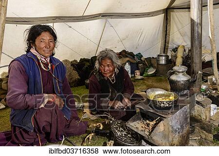 "Nomad women preparing food inside their tent, Korzok, Ladakh, Jammu and Kashmir, India, Asia" View Large Photo Image Stock Photo - "Nomad women preparing food inside their tent, Korzok, Ladakh, Jammu and Kashmir, India, Asia". Fotosearch