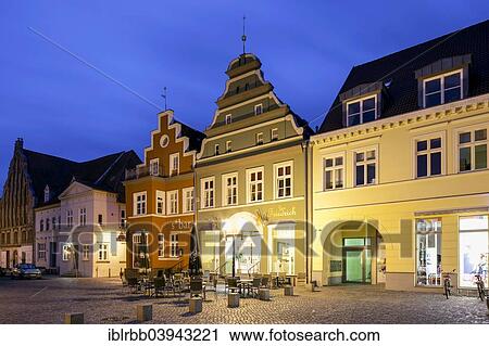 Stock Image - "North German gabled houses on the market square, Hanseatic City of Greifswald, Mecklenburg-Western Pomerania, Germany, Europe". Fotosearch