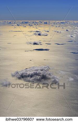 "North Sea stretching to the horizon, view from 3000 feet across the open sea, cumulus clouds and cloud shadows, North Sea, Schleswig-Holstein, Germany, Europe" View Large Photo Image Stock Photo - "North Sea stretching to the horizon, view from 3000 feet across the open sea, cumulus clouds and cloud shadows, North Sea, Schleswig-Holstein, Germany, Europe". Fotosearch