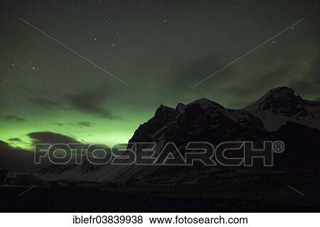 "Northern lights over a mountain range, Horn, Hofn i Hornafiroi, Hornafjorour, Iceland, Europe" View Large Photo Image Stock Photo - "Northern lights over a mountain range, Horn, Hofn i Hornafiroi, Hornafjorour, Iceland, Europe". Fotosearch