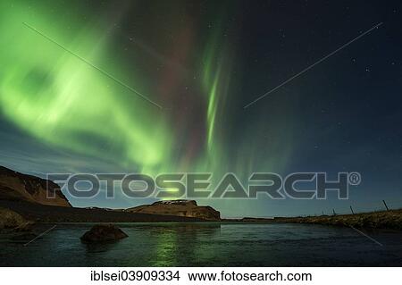 "Northern Lights over a small lake, Vik, Southern Region, Iceland, Europe" View Large Photo Image Picture - "Northern Lights over a small lake, Vik, Southern Region, Iceland, Europe". Fotosearch