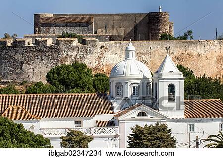 Picture - "Nossa Senhora dos Martires Church and castle, Castro Marim, Algarve, Portugal, Europe". Fotosearch