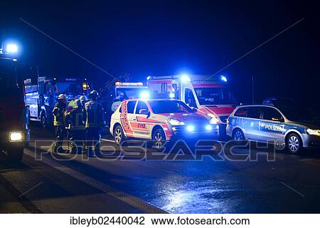 "Notarzt, German for emergency physician, driving a Porsche Cayenne at the scene of an accident on the A8 motorway near the junction of Autobahnkreuz Stuttgart, Baden-Wuerttemberg, Germany, Europe" View Large Photo Image Stock Image - "Notarzt, German for emergency physician, driving a Porsche Cayenne at the scene of an accident on the A8 motorway near the junction of Autobahnkreuz Stuttgart, Baden-Wuerttemberg, Germany, Europe". Fotosearch