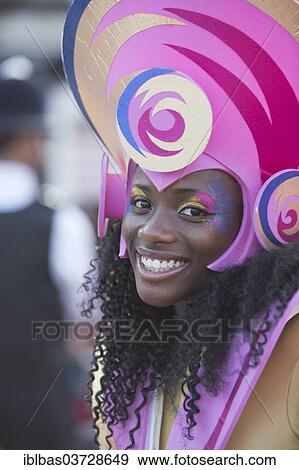 "Notting Hill Carnival, costumed member of the carnival group Mahogany on parade, Notting Hill, London, London region, England, United Kingdom, Europe" View Large Photo Image Stock Photo - "Notting Hill Carnival, costumed member of the carnival group Mahogany on parade, Notting Hill, London, London region, England, United Kingdom, Europe". Fotosearch