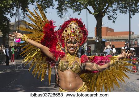 "Notting Hill Carnival, costumed member of the Paraiso School of Samba on parade, Notting Hill, London, London region, England, United Kingdom, Europe" View Large Photo Image Stock Photo - "Notting Hill Carnival, costumed member of the Paraiso School of Samba on parade, Notting Hill, London, London region, England, United Kingdom, Europe". Fotosearch