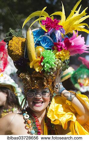 "Notting Hill Carnival, costumed member of the Paraiso School of Samba with a Carmen Miranda-style headdress on parade, Notting Hill, London, London region, England, United Kingdom, Europe" View Large Photo Image Stock Photograph - "Notting Hill Carnival, costumed member of the Paraiso School of Samba with a Carmen Miranda-style headdress on parade, Notting Hill, London, London region, England, United Kingdom, Europe". Fotosearch