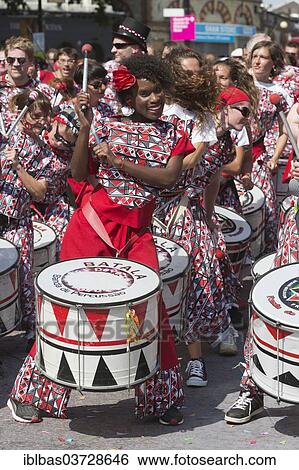 "Notting Hill Carnival, costumed members of the Batala drumming company on parade, Notting Hill, London, London region, England, United Kingdom, Europe" View Large Photo Image Stock Photograph - "Notting Hill Carnival, costumed members of the Batala drumming company on parade, Notting Hill, London, London region, England, United Kingdom, Europe". Fotosearch