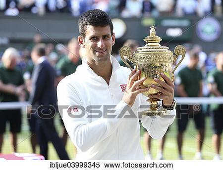 "Novak Djokovic, SRB, holding the cup, Wimbledon Championships in 2014, ITF Grand Slam Tennis Tournament, AELTC, All England Lawn Tennis and Croquet Club, London, England, United Kingdom, Europe" View Large Photo Image Stock Photography - "Novak Djokovic, SRB, holding the cup, Wimbledon Championships in 2014, ITF Grand Slam Tennis Tournament, AELTC, All England Lawn Tennis and Croquet Club, London, England, United Kingdom, Europe". Fotosearch