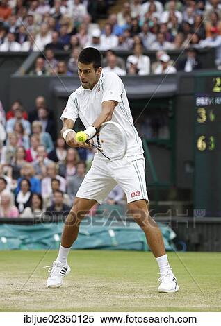 "Novak Djokovic, SRB, men's semi-final match, Wimbledon Championships 2012 AELTC, ITF Grand Slam Tennis Tournament, London, England, United Kingdom, Europe" View Large Photo Image Stock Photography - "Novak Djokovic, SRB, men's semi-final match, Wimbledon Championships 2012 AELTC, ITF Grand Slam Tennis Tournament, London, England, United Kingdom, Europe". Fotosearch