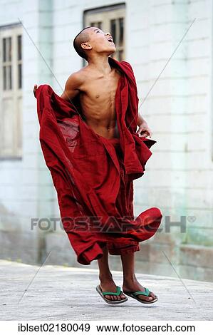 "Novice jumping in a monastery, Myanmar, Burma, Southeast Asia, Asia" View Large Photo Image Stock Photo - "Novice jumping in a monastery, Myanmar, Burma, Southeast Asia, Asia". Fotosearch