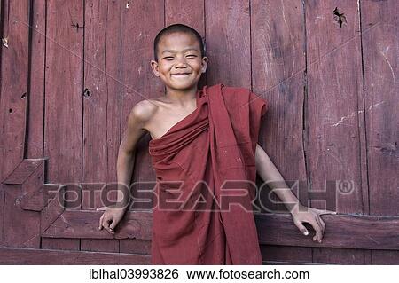 "Novice monk in the Shwe Yaunghwe Kyaung Monastery, near Nyaungshwe, Shan State, Inle Lake, Myanmar, Asia" View Large Photo Image Stock Photograph - "Novice monk in the Shwe Yaunghwe Kyaung Monastery, near Nyaungshwe, Shan State, Inle Lake, Myanmar, Asia". Fotosearch
