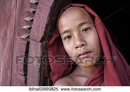 "Novice monk in the Shwe Yaunghwe Kyaung Monastery, near Nyaungshwe, Shan State, Inle Lake, Myanmar, Asia" View Large Photo Image Stock Photography - "Novice monk in the Shwe Yaunghwe Kyaung Monastery, near Nyaungshwe, Shan State, Inle Lake, Myanmar, Asia". Fotosearch
