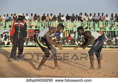 "Nuba fighting, Nuba Wrestling, Haj Yusef district, Kharthoum, Sudan, Africa" View Large Photo Image Stock Image - "Nuba fighting, Nuba Wrestling, Haj Yusef district, Kharthoum, Sudan, Africa". Fotosearch