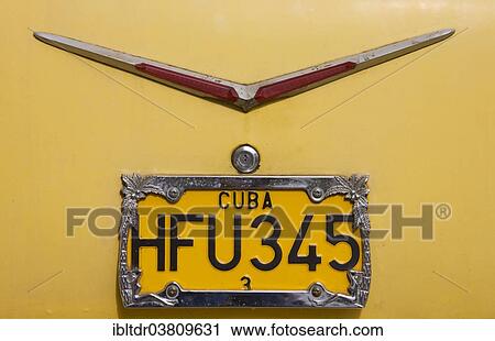 Stock Image - "Number plate of a Chevrolet, classic car, Havana, Cuba, North America". Fotosearch