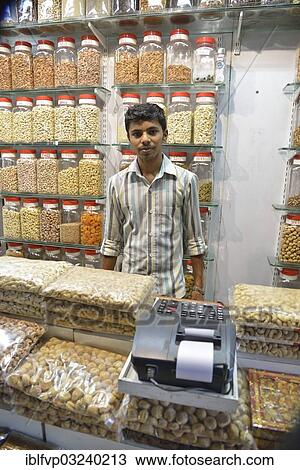 Stock Image - "Nut seller at the Crawford Market, Mumbai, Maharashtra, India, Asia". Fotosearch