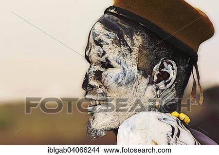 "Nyangatom or Bume man with painted face, Omo river Valley, Ethiopia, Africa" View Large Photo Image Picture - "Nyangatom or Bume man with painted face, Omo river Valley, Ethiopia, Africa". Fotosearch