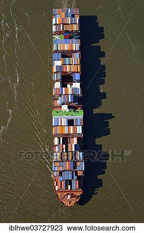Stock Image - "NYK Venus, container ship of the shipping company NYK Lines, aerial view, Hamburg, Hamburg, Germany, Europe". Fotosearch