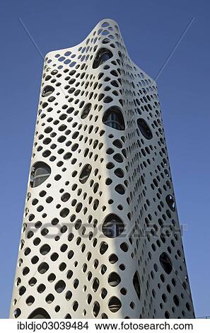 "O-14 Tower, nicknamed Cheese Tower, against a blue sky, Business Bay, Emirate of Dubai, United Arab Emirates, Asia" View Large Photo Image Picture - "O-14 Tower, nicknamed Cheese Tower, against a blue sky, Business Bay, Emirate of Dubai, United Arab Emirates, Asia". Fotosearch