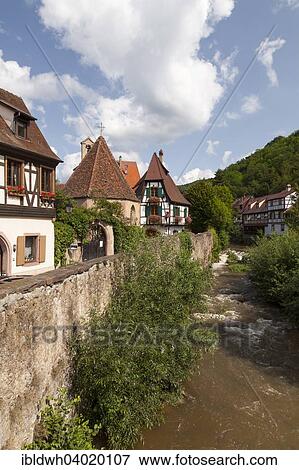"Oberhof Chapel and half-timbered houses on the river Weiss, Kaysersberg, Alsace, France, Europe" View Large Photo Image Stock Photo - "Oberhof Chapel and half-timbered houses on the river Weiss, Kaysersberg, Alsace, France, Europe". Fotosearch