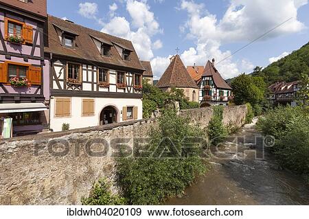 "Oberhof Chapel and half-timbered houses on the river Weiss, Kaysersberg, Alsace, France, Europe" View Large Photo Image Stock Photo - "Oberhof Chapel and half-timbered houses on the river Weiss, Kaysersberg, Alsace, France, Europe". Fotosearch