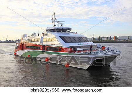 Stock Photograph - "Ocean-going catamaran, Halunder Jet, Heligoland ferry on the way to Heligoland, Hamburg, Germany, Europe". Fotosearch
