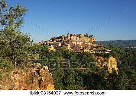 "Ocres, ochre rocks with the old town, Roussillon, Provence, Region Provence-Alpes-Cote d? ÇÖAzur, France, Europe" View Large Photo Image Stock Photo - "Ocres, ochre rocks with the old town, Roussillon, Provence, Region Provence-Alpes-Cote d? ÇÖAzur, France, Europe". Fotosearch