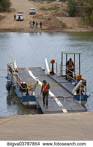 "Octha ferry pontoon across the Orange River between South Africa and Namibia, Sendelingsdrif pier, Richtersveld, South Africa, Africa" View Large Photo Image Picture - "Octha ferry pontoon across the Orange River between South Africa and Namibia, Sendelingsdrif pier, Richtersveld, South Africa, Africa". Fotosearch