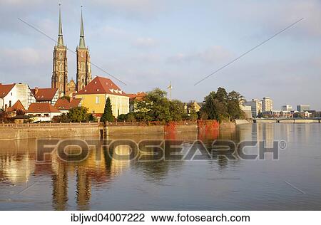 Stock Image - "Odra River with Cathedral Island Ostrow Tumski, Cathedral of St. John the Baptist and the Archbishop's residence, Wroclaw, Poland, Europe". Fotosearch