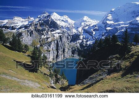 "Oeschinensee Lake, peaks from left to right Mt Wildi Frau, Mt Blueemlisalp, Mt Fruendenhorn, Mt Doldenhorn, Berner Oberland, Kandersteg, Canton of Bern, Switzerland, Europe" View Large Photo Image Stock Photo - "Oeschinensee Lake, peaks from left to right Mt Wildi Frau, Mt Blueemlisalp, Mt Fruendenhorn, Mt Doldenhorn, Berner Oberland, Kandersteg, Canton of Bern, Switzerland, Europe". Fotosearch