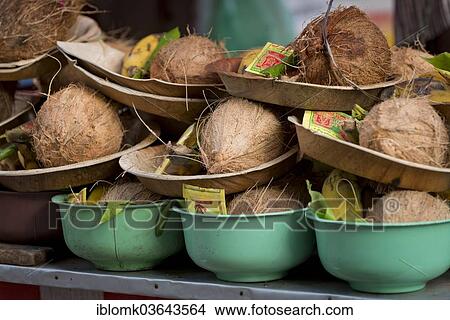Picture - "Offering bowls with coconuts, Meenakshi Amman Temple or Sri Meenakshi Sundareswarar Temple, Madurai, Tamil Nadu, India, Asia". Fotosearch