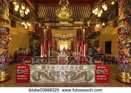 "Offerings at the altar of the Chinese Sanjao Phuya Temple or Saan Chao Pu Ya Temple, Udon Thani, Isan, Thailand, Asia" View Large Photo Image Stock Photography - "Offerings at the altar of the Chinese Sanjao Phuya Temple or Saan Chao Pu Ya Temple, Udon Thani, Isan, Thailand, Asia". Fotosearch