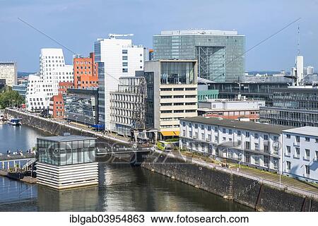 "Office buildings, New Zollhof, Medienhafen or Media Harbour, Dusseldorf, Rhineland, North Rhine-Westphalia, Germany, Europe" View Large Photo Image Stock Image - "Office buildings, New Zollhof, Medienhafen or Media Harbour, Dusseldorf, Rhineland, North Rhine-Westphalia, Germany, Europe". Fotosearch