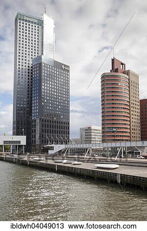 "Office skyscrapers at Wilhelminaplein on the Nieuwe Maas river, Rotterdam, Holland, The Netherlands, Europe" View Large Photo Image Stock Image - "Office skyscrapers at Wilhelminaplein on the Nieuwe Maas river, Rotterdam, Holland, The Netherlands, Europe". Fotosearch